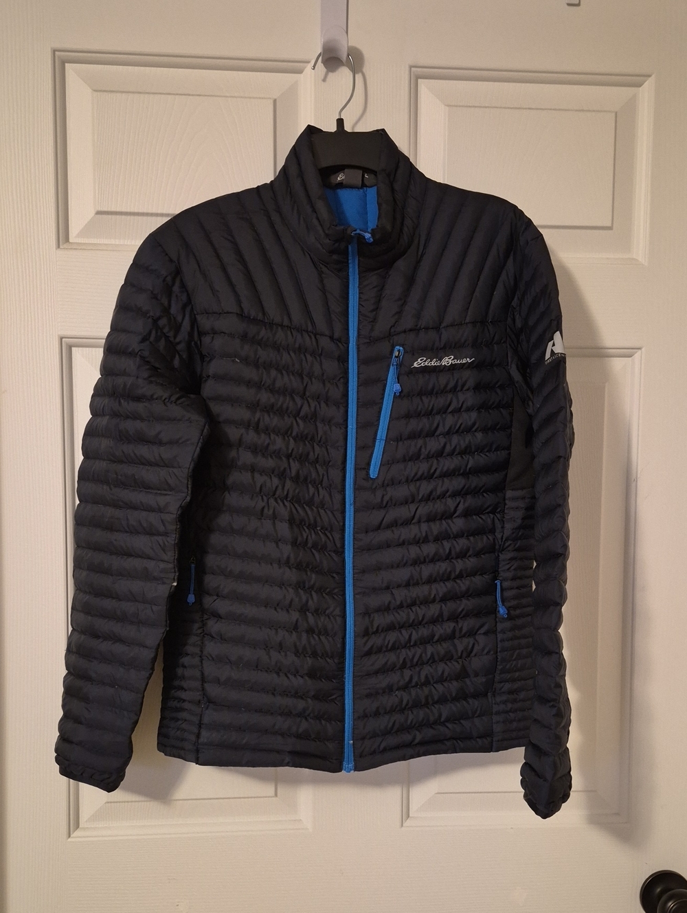 Eddie Bauer Men’s Black Puffer Jacket with Blue Accents